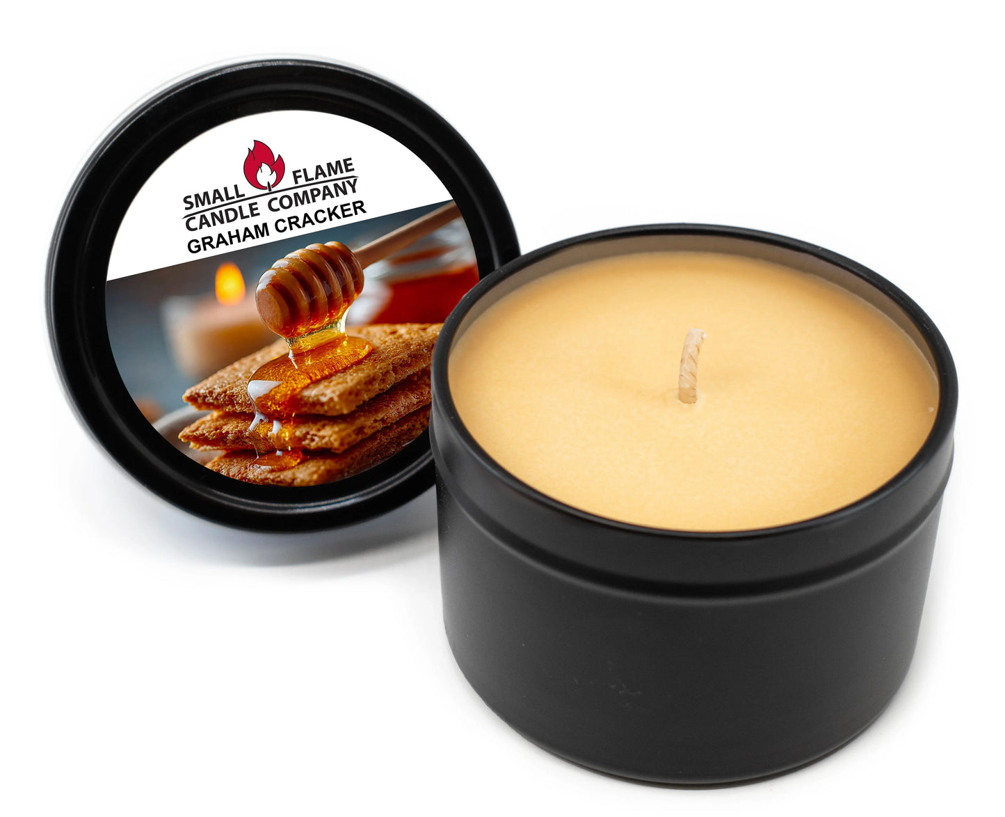 Graham Cracker scented coconut-soy candle in black tin with honey and crackers label.
