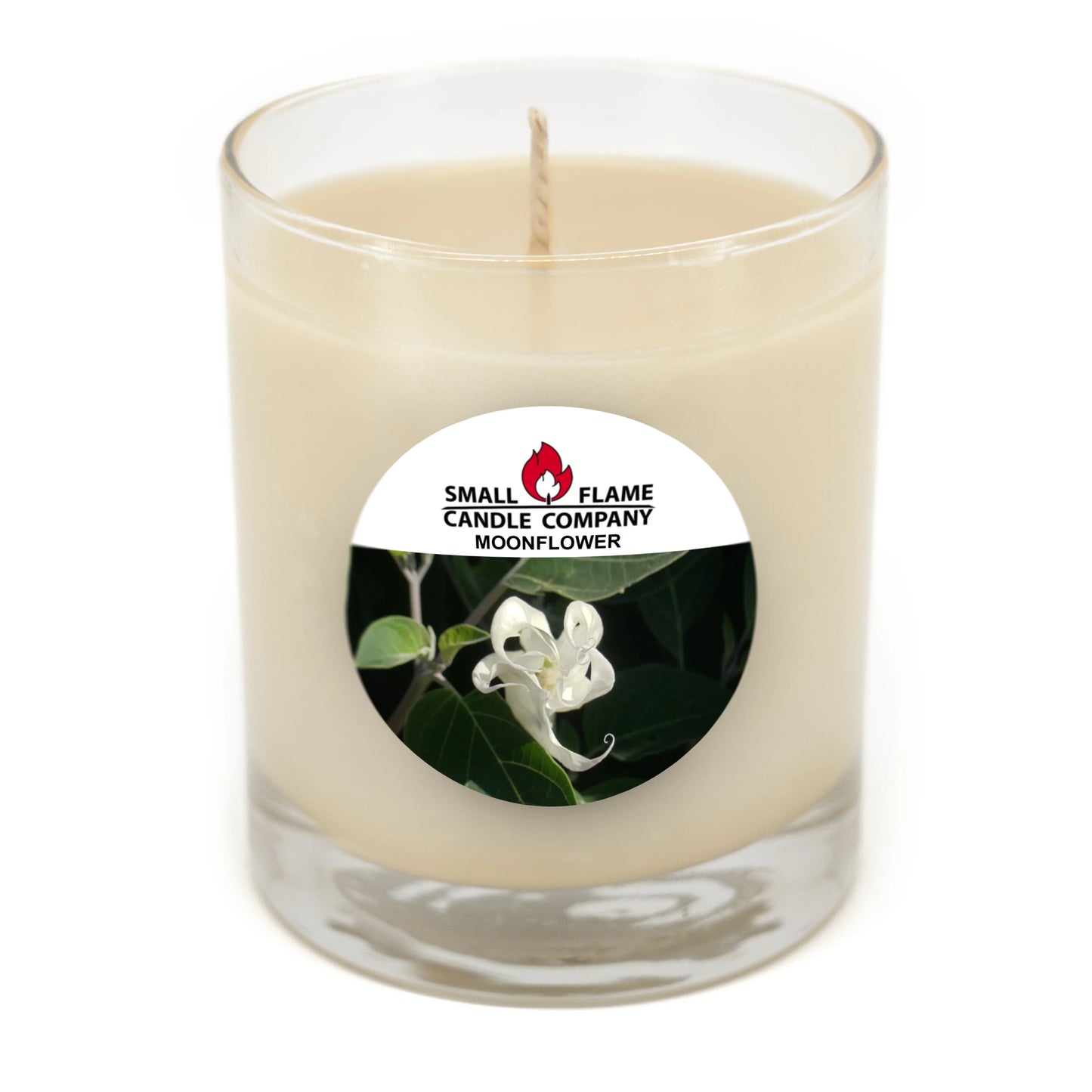 Moonflower scented coconut-soy candle in a glass jar with floral label