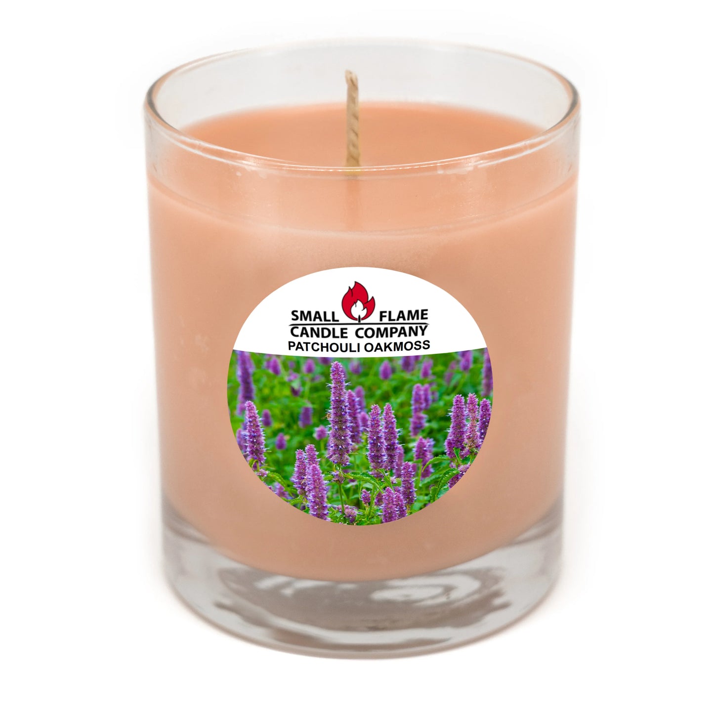Patchouli Oakmoss coconut-soy candle in glass jar with floral label