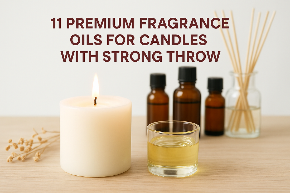 Lit white candle with fragrance oil bottles, glass of oil, and reed diffuser on wooden surface