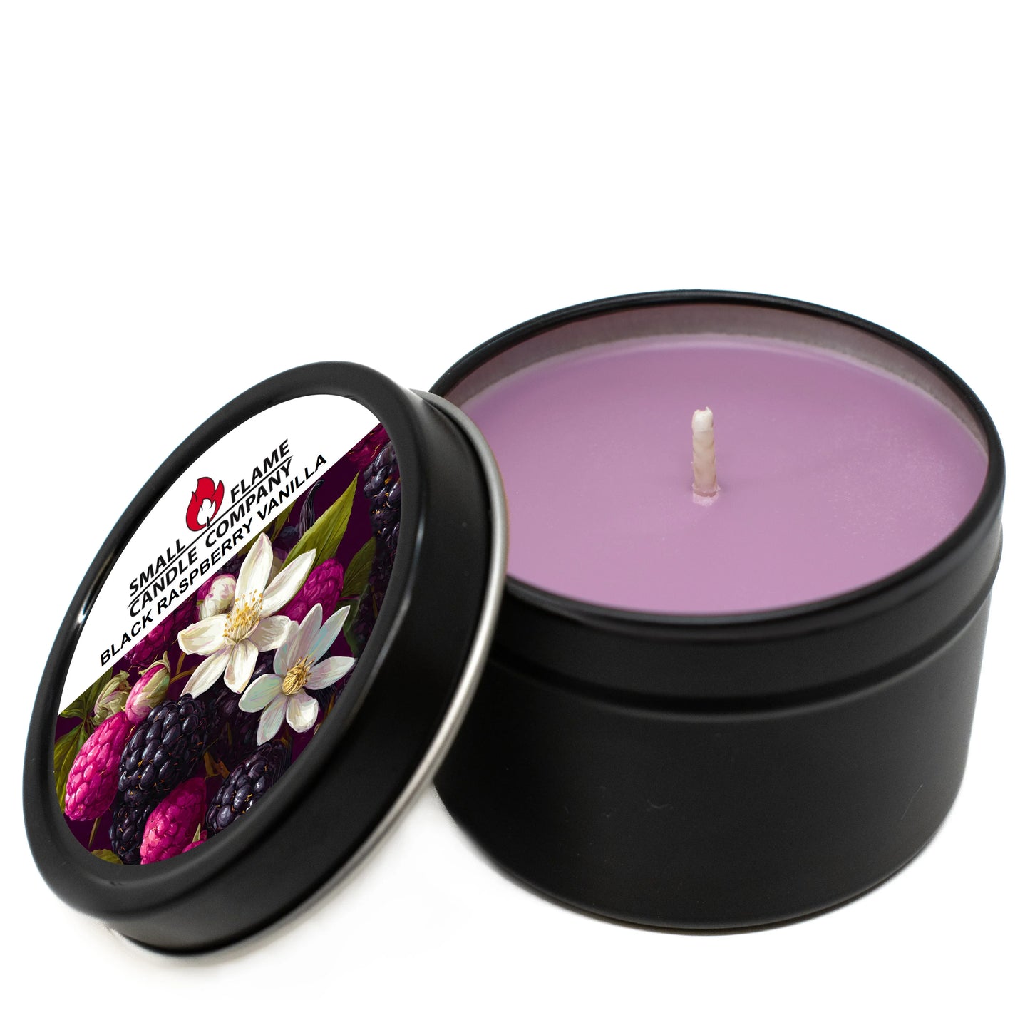 Purple soy candle in black tin labeled black raspberry vanilla with floral berry design.
