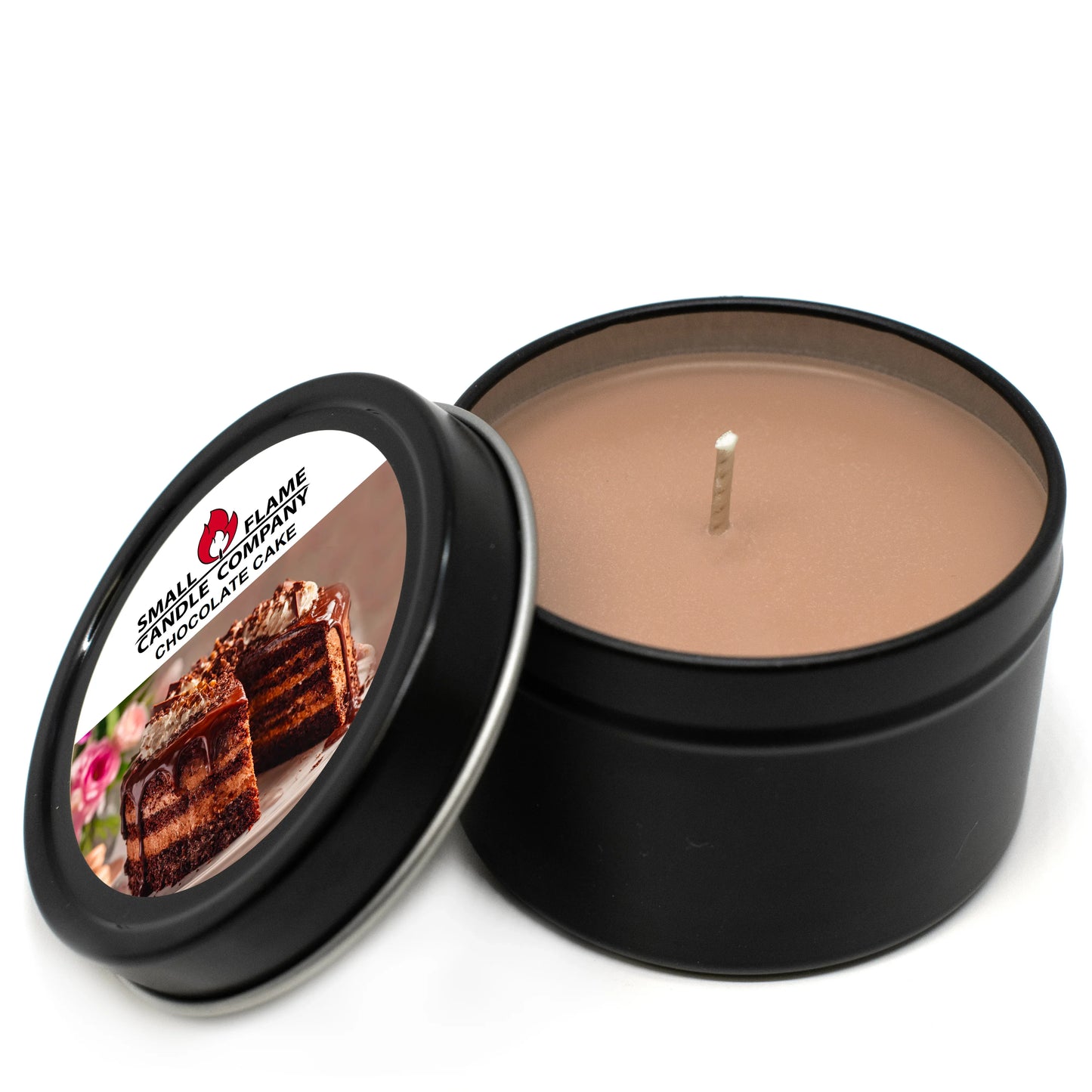 A round tin Chocolate Cake Candle by Small Flame Candle Company features chocolate-brown coconut soy wax and a lid with cake slices. Labeled "Chocolate Cake Candles and Melts," it's crafted with natural fragrance oils for an irresistible scent.