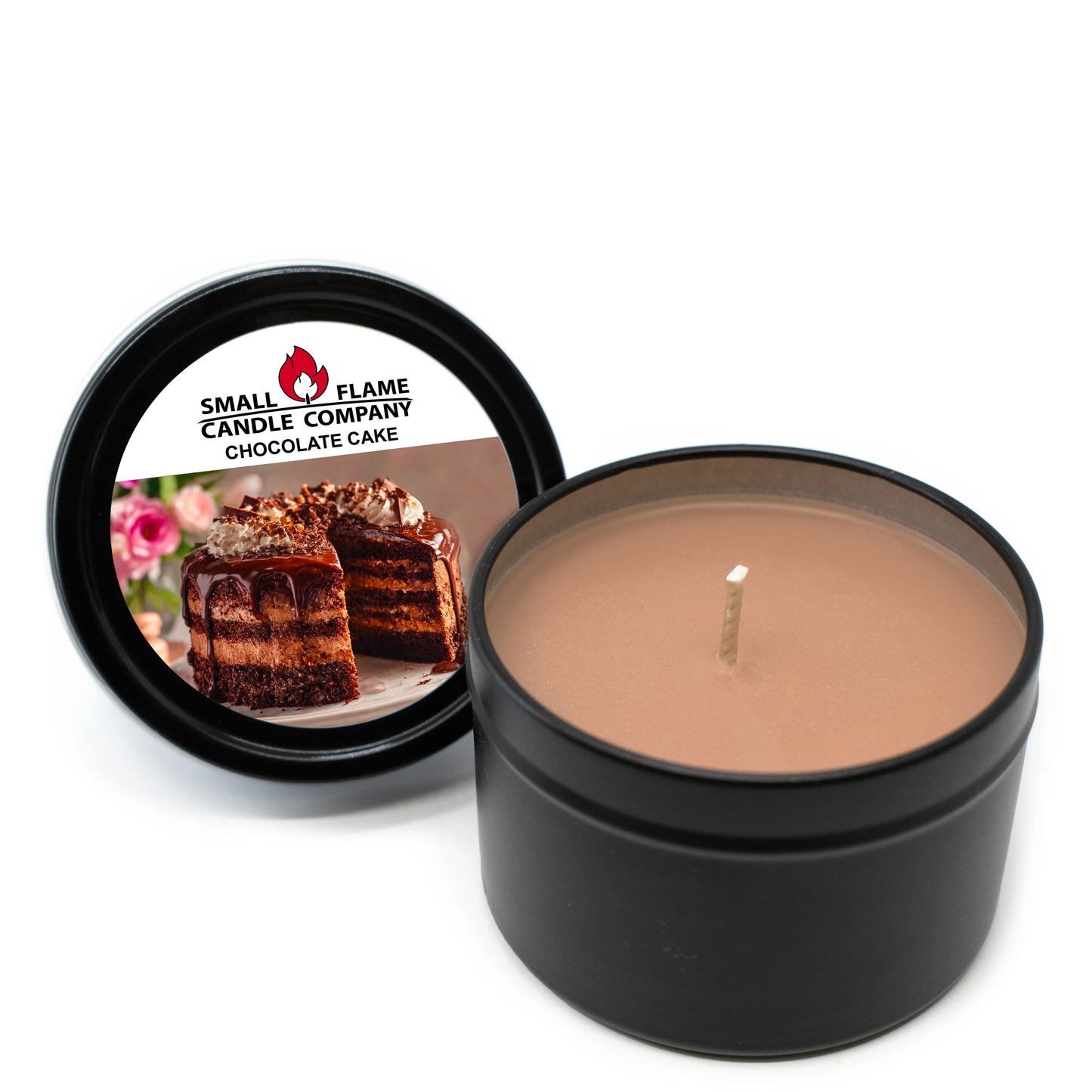 A brown Chocolate Cake Candle in a black tin with the lid off. The label reads Small Flame Candle Company Chocolate Cake Candles and Melts, features a cake slice image, and uses coconut soy wax and natural fragrance oils for a delightful scent.