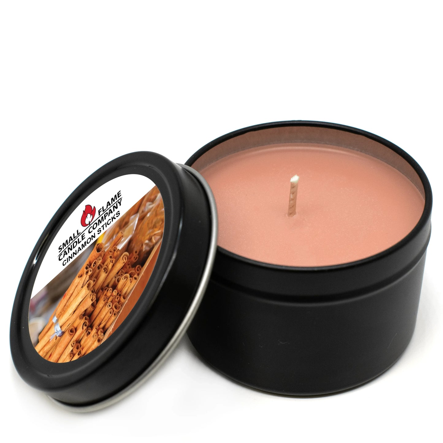 Cinnamon scented coconut-soy candle in black tin with cinnamon sticks label