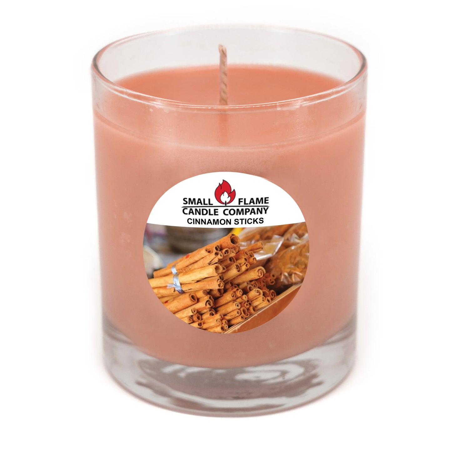Cinnamon sticks scented coconut-soy candle in clear glass jar with cinnamon label