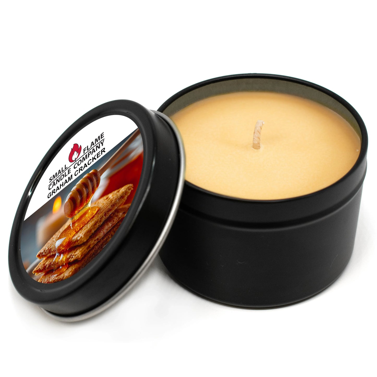 Graham Cracker scented coconut-soy candle in a black tin with label and honey drizzle image