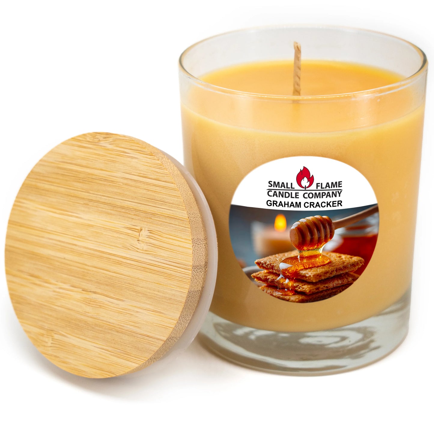 Graham cracker scented coconut-soy candle in glass jar with bamboo lid