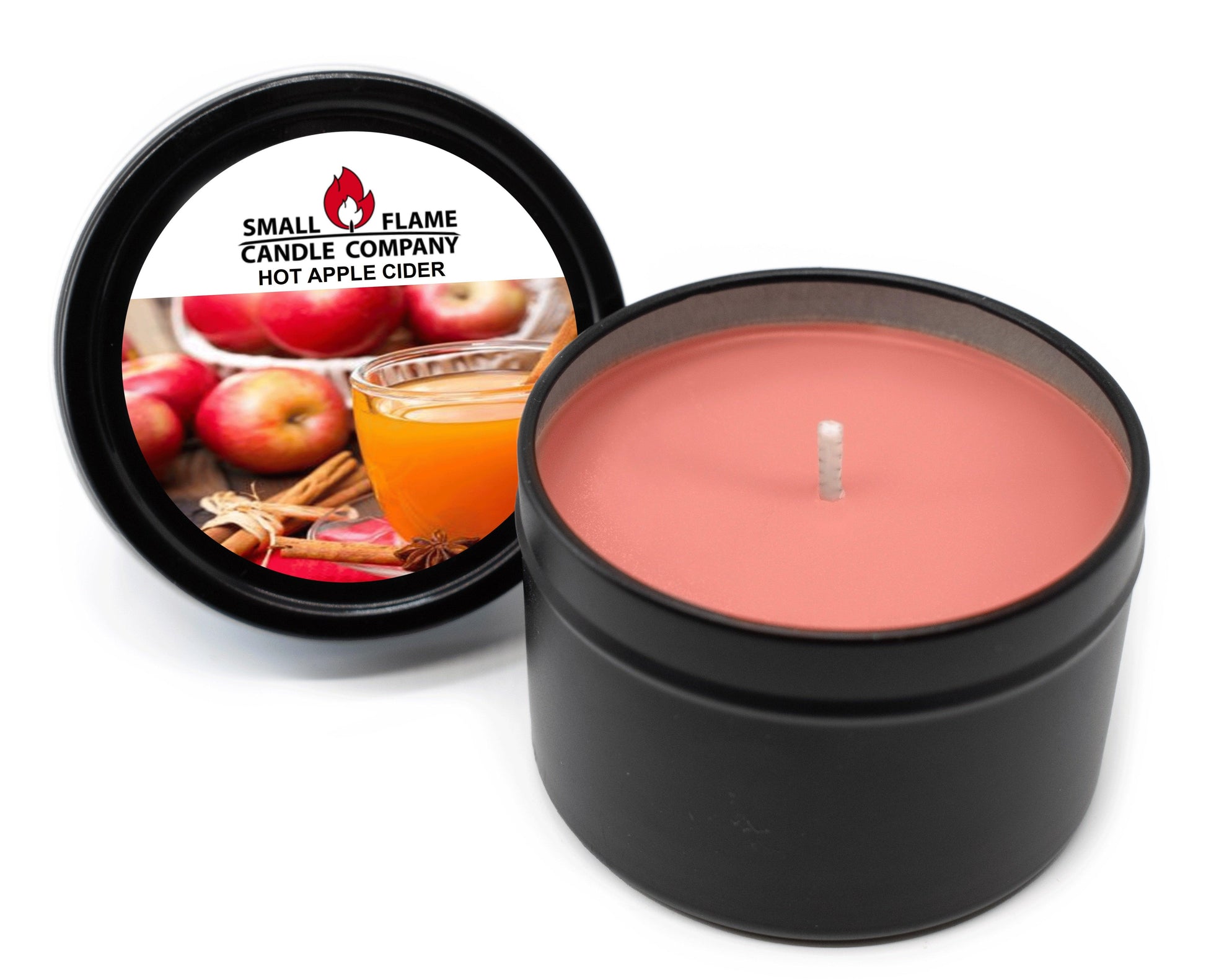 Hot apple cider scented candle in black tin, with apples and cinnamon label.