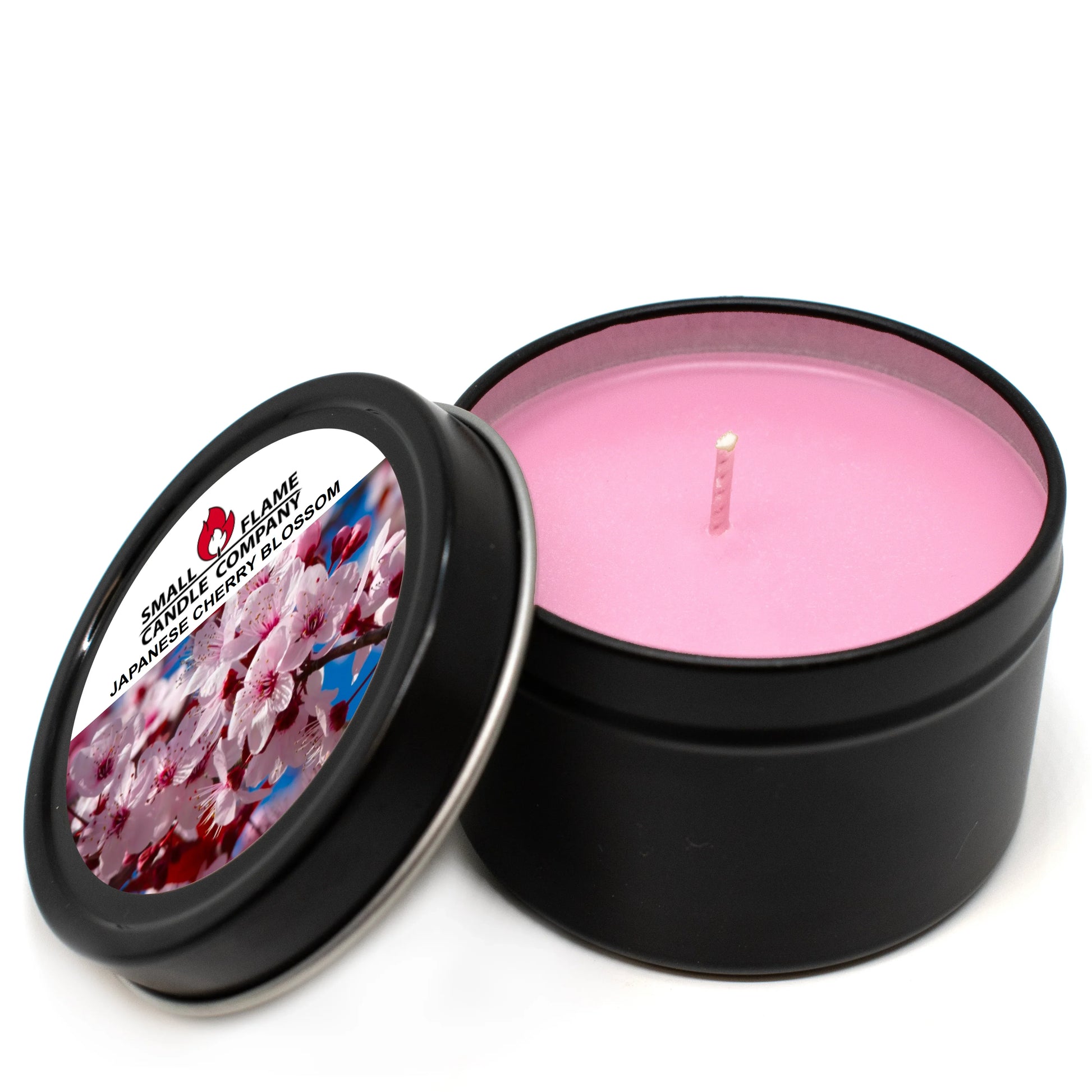 Pink Japanese cherry blossom candle in black tin with floral-printed lid