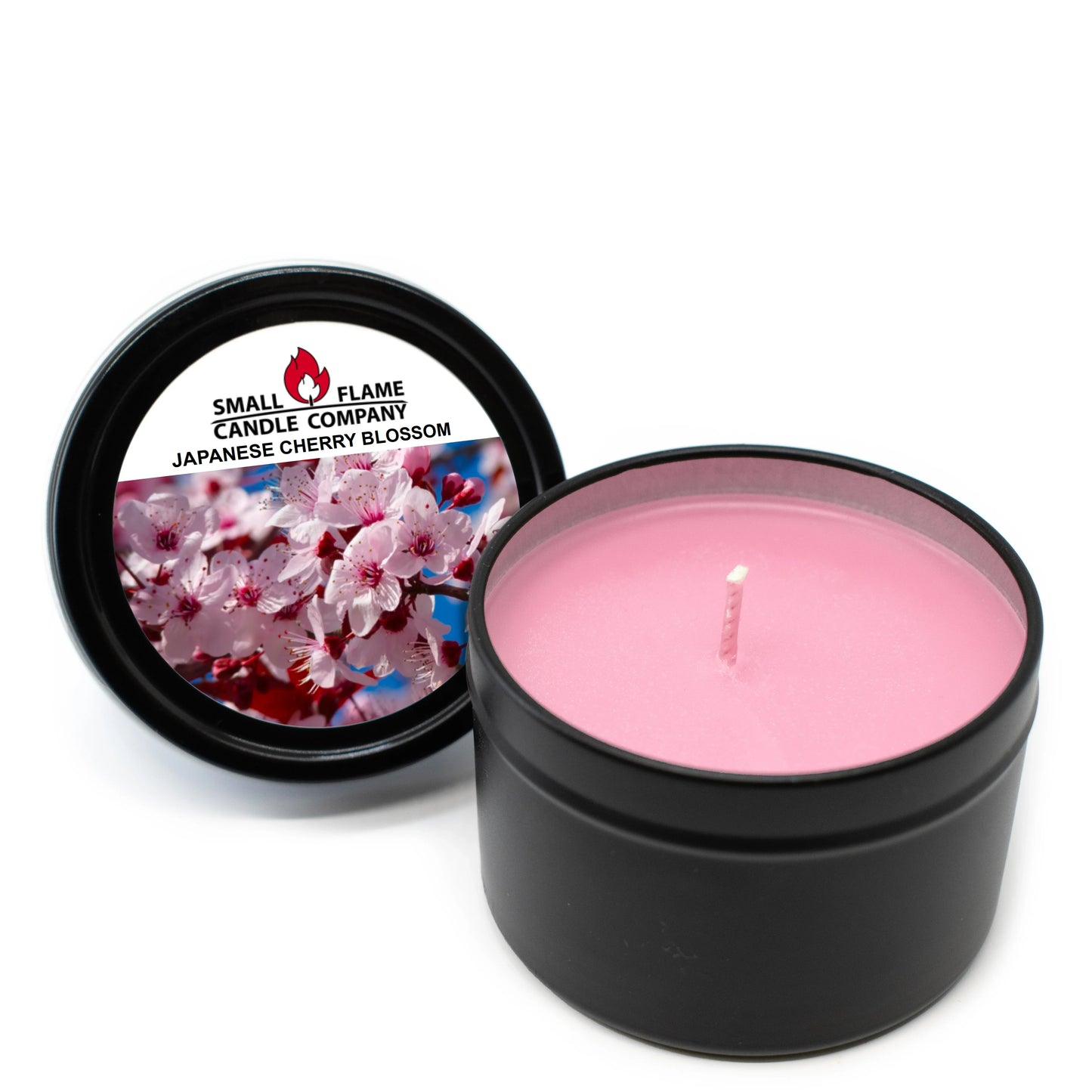 Pink Japanese cherry blossom scented candle in black tin with floral label.