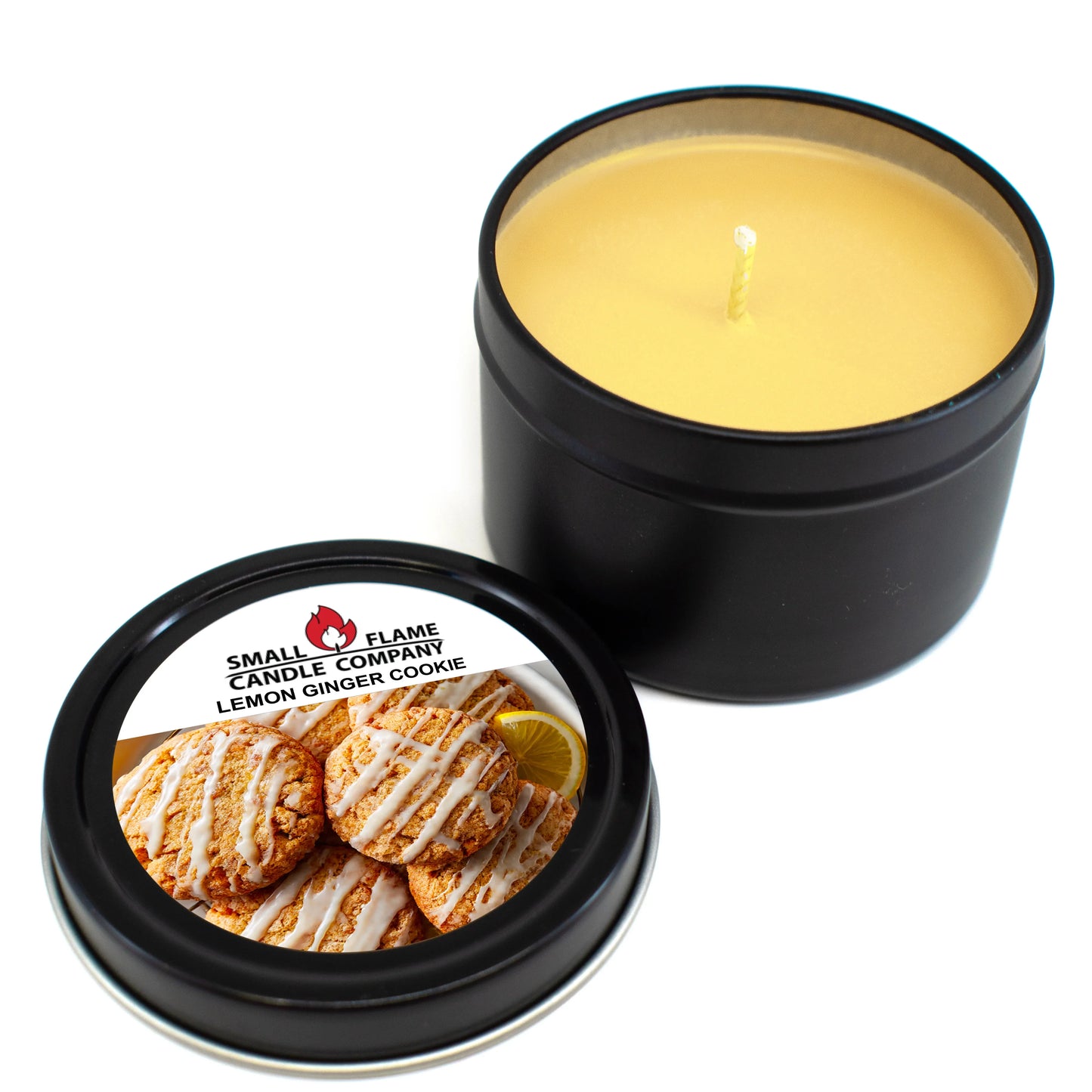 Lemon ginger cookie scented candle in black tin with matching labeled lid
