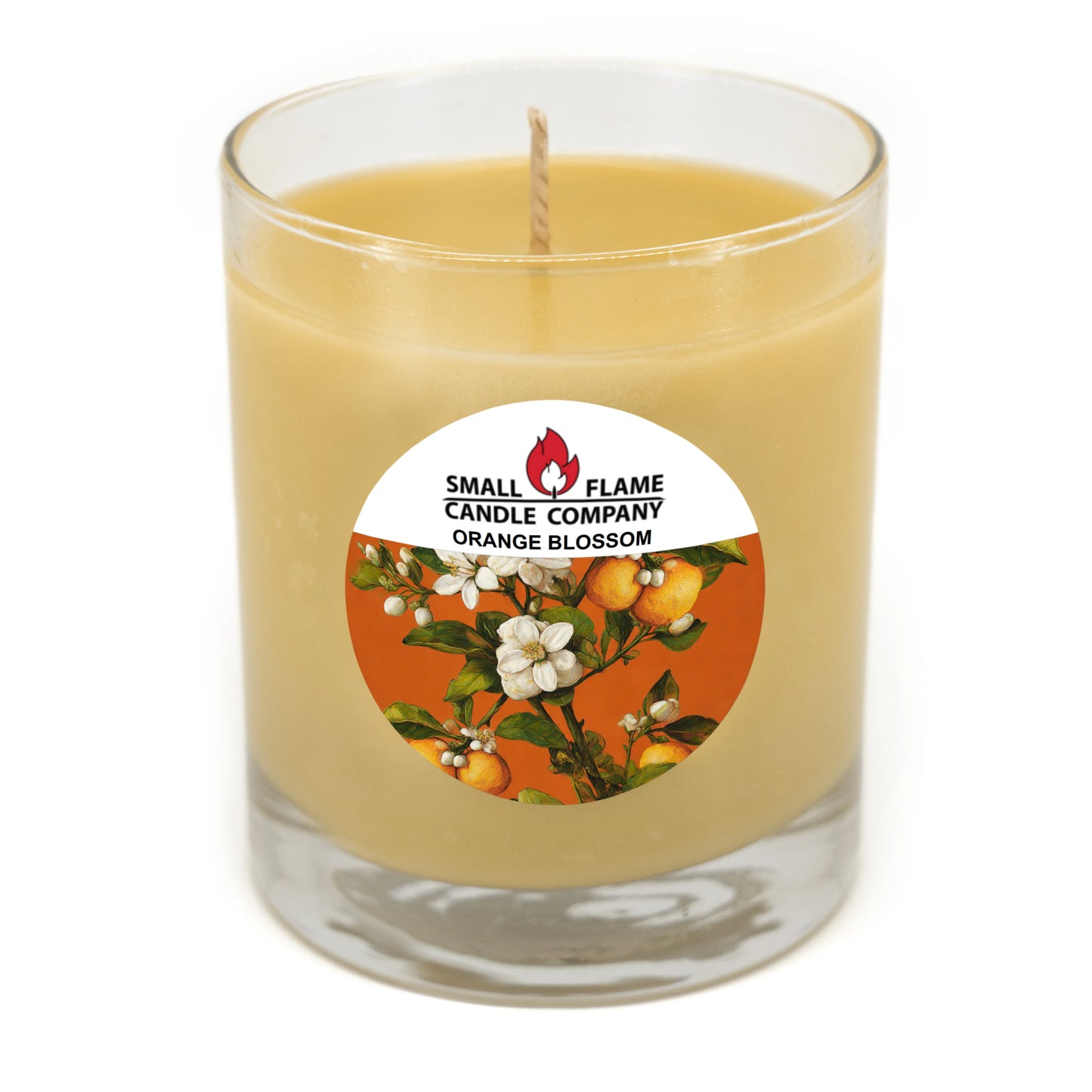 Hand-poured orange blossom coconut-soy candle in glass jar with floral label