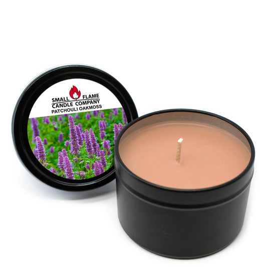 Patchouli Oakmoss coconut-soy candle in black tin with botanical label lid