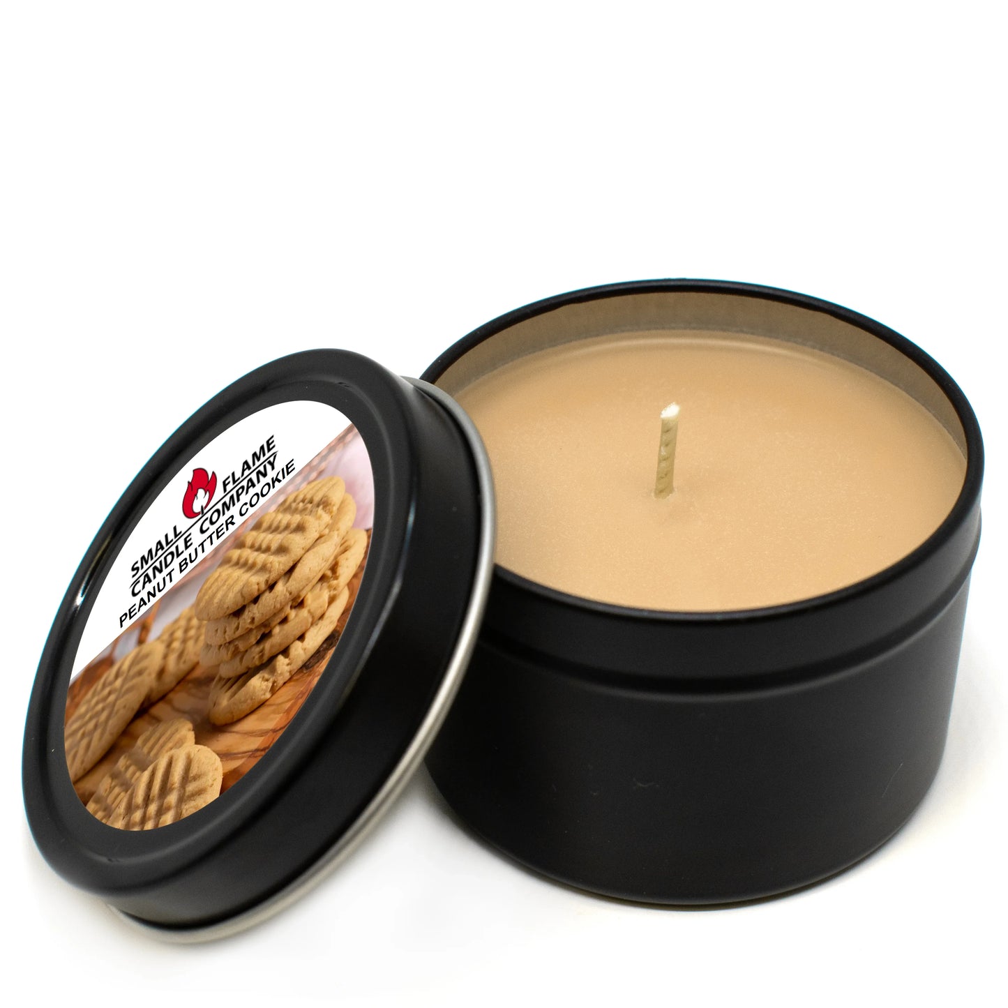 Peanut butter cookie scented candle in black tin with cookies on the lid label