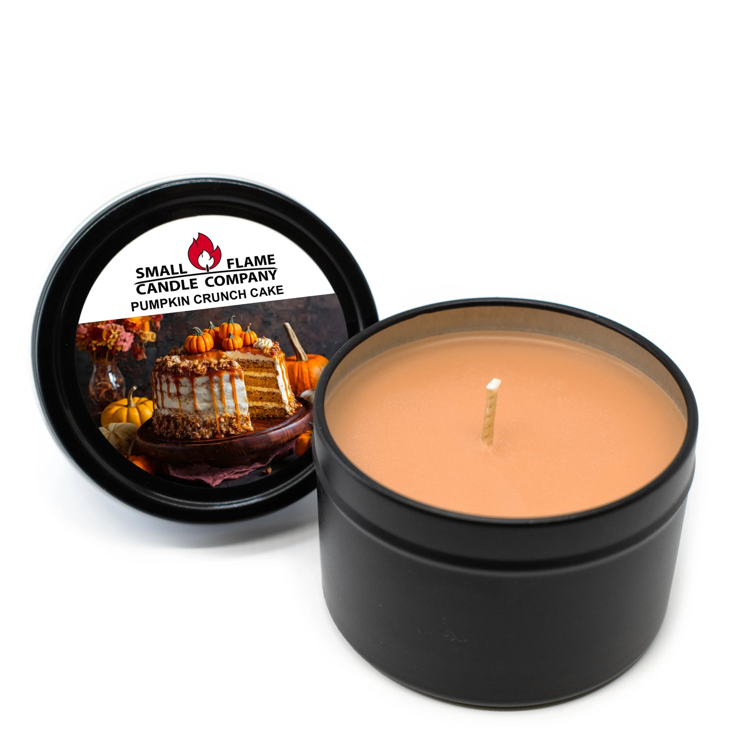 Pumpkin Crunch Cake scented candle in black tin with creamy orange wax and festive label.